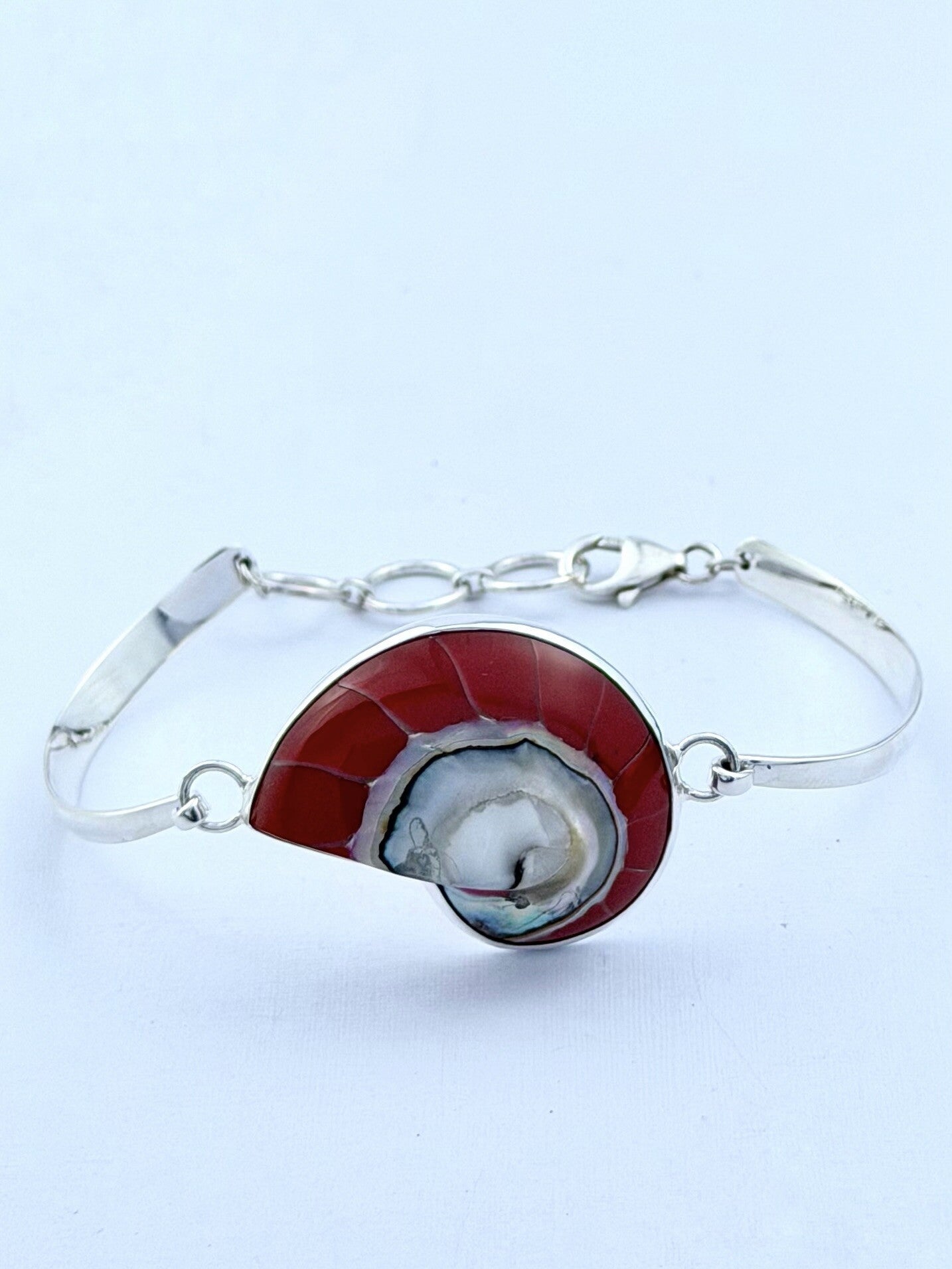 Handmade 925 sterling silver bracelet with a red nautilus shell — Sribnyak Baroque Pearls