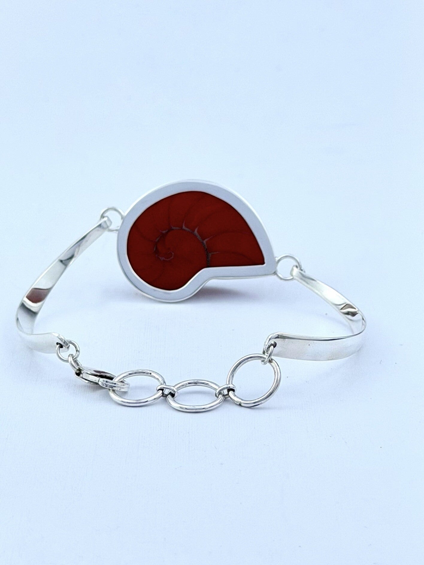 Handmade 925 sterling silver bracelet with a red nautilus shell — Sribnyak Baroque Pearls