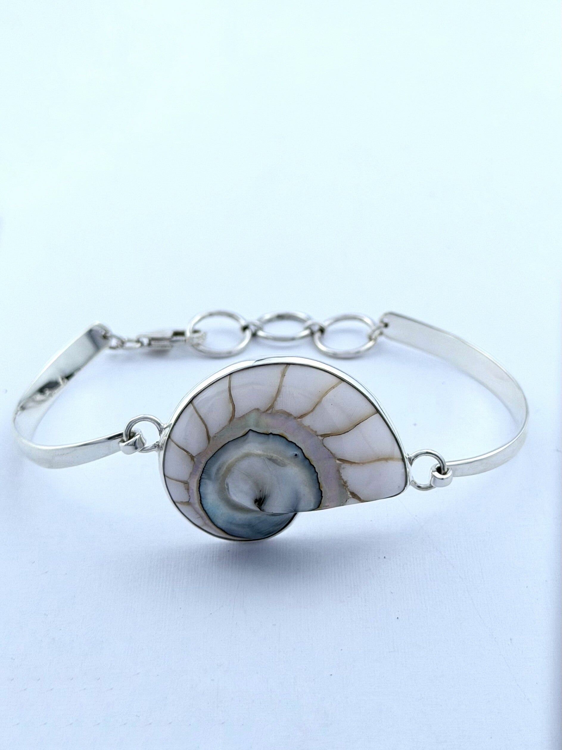 Handmade 925 sterling silver bracelet with a white nautilus shell — Sribnyak Baroque Pearls
