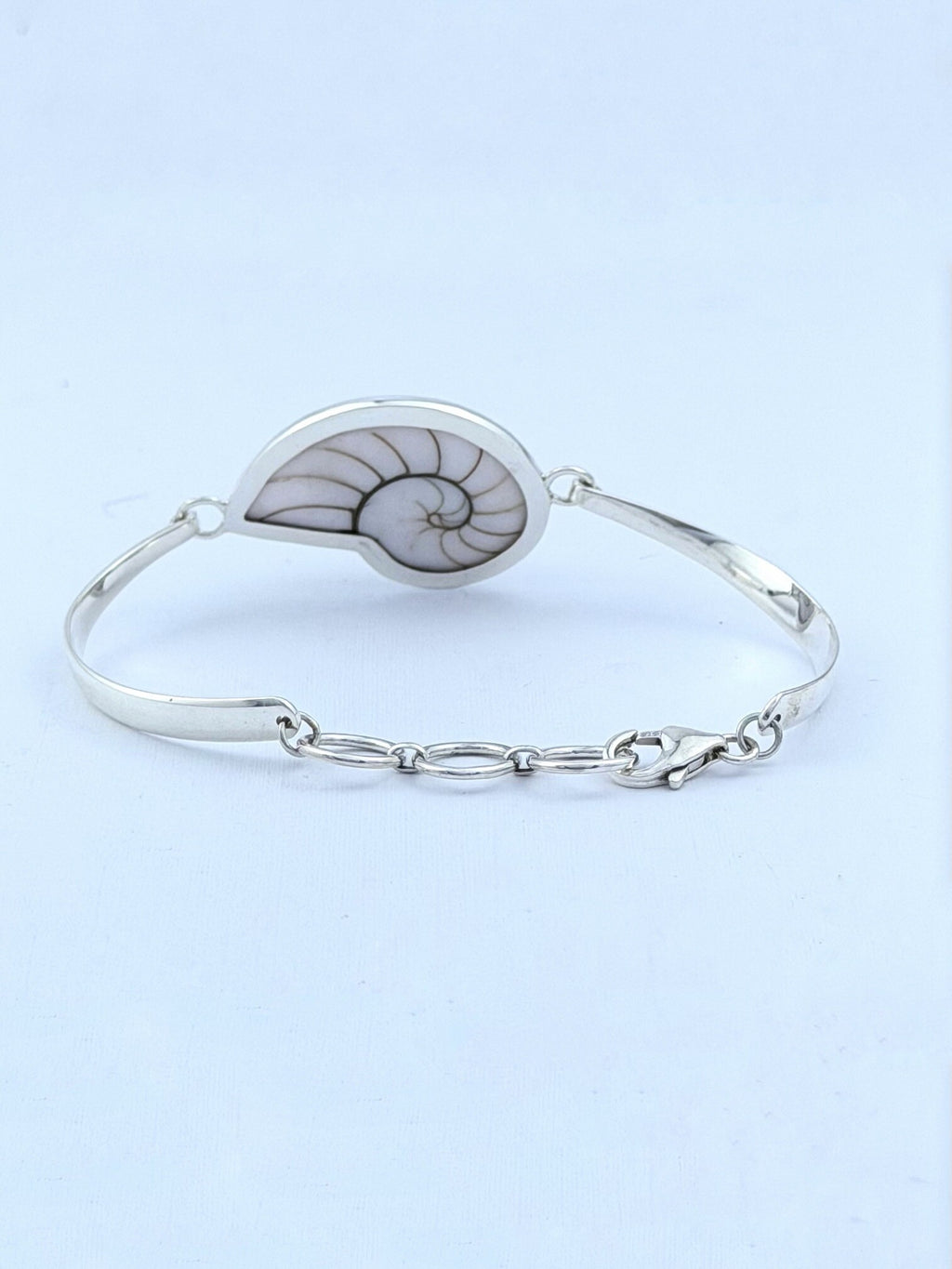 Handmade 925 sterling silver bracelet with a white nautilus shell — Sribnyak Baroque Pearls