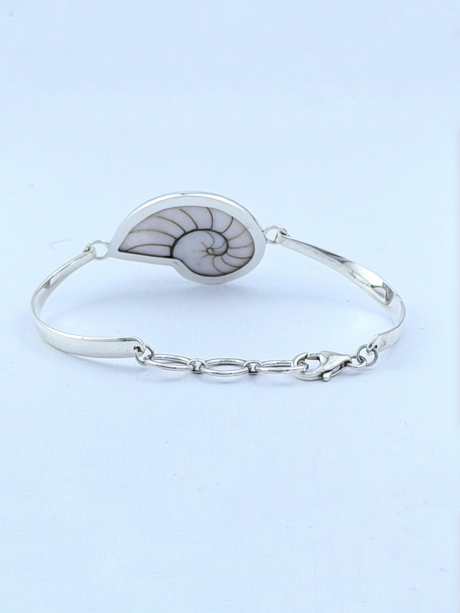 Handmade 925 sterling silver bracelet with a white nautilus shell — Sribnyak Baroque Pearls